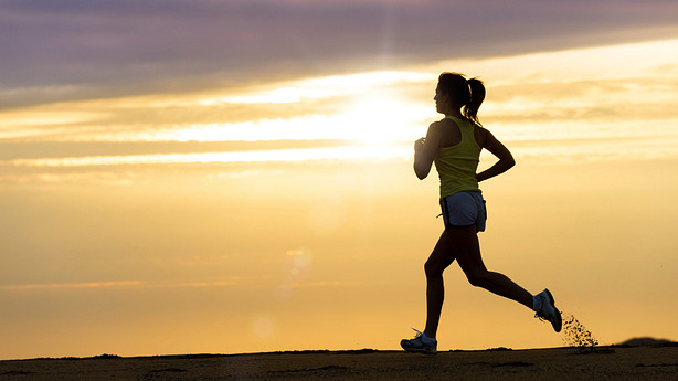 Woman Running at sunset