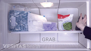 Open view of a freezer with various types of ice packs