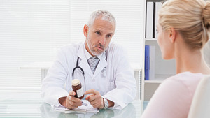 Consultation between doctor and patient