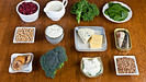 Food sources of calcium including broccoli, beans, spinach, milk, and cheese