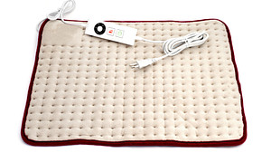 Heating pad with control and plug
