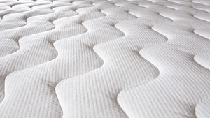 Closeup of a plush mattress