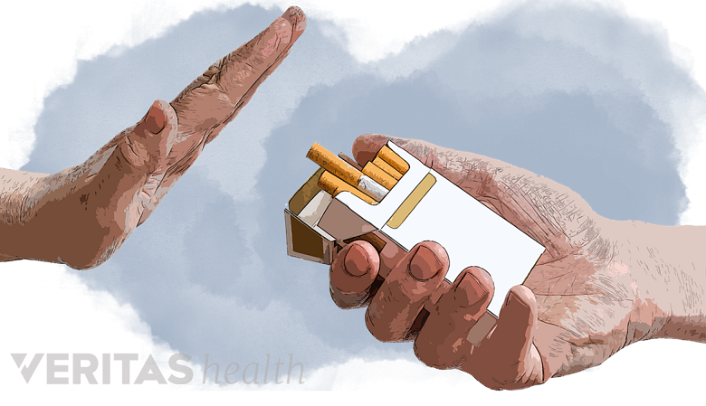 An illustration showing a hand and a pack of cigarette.
