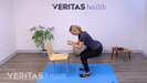 Woman doing a knee strengthening squat