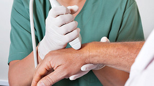 Ultrasound on a patient&#039;s wrist.