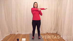 Woman doing crossover shoulder stretch