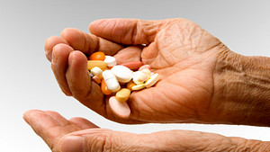 A hand full of pills