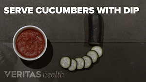 Beet dip with cucumber slices