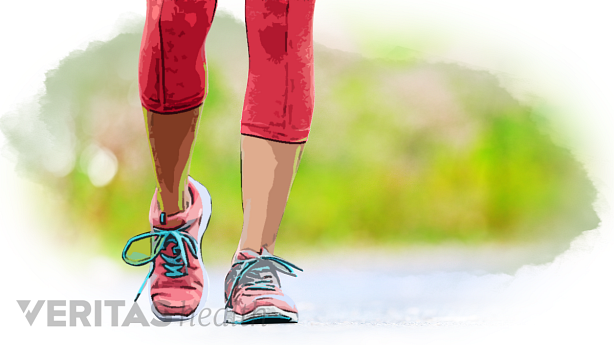 A woman walking with her walking shoes.