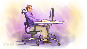 Man sitting correctly in his office chair.