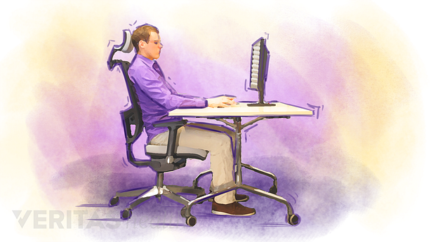 Illustration of a man sitting at a desk with good posture.