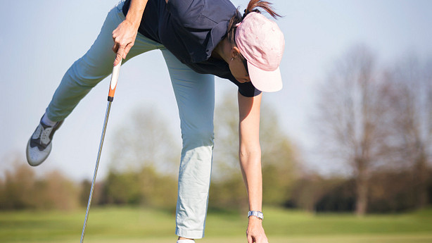 Woman using golf lift