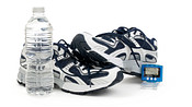 Pair of sneakers, pedometer and water bottle