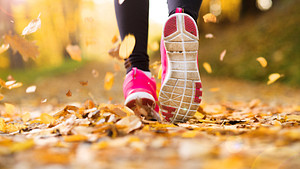 Running feet through fall leaves.